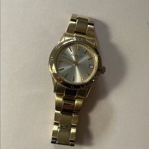 Kenneth Cole Gold Wristwatch with Champagne color dial and date